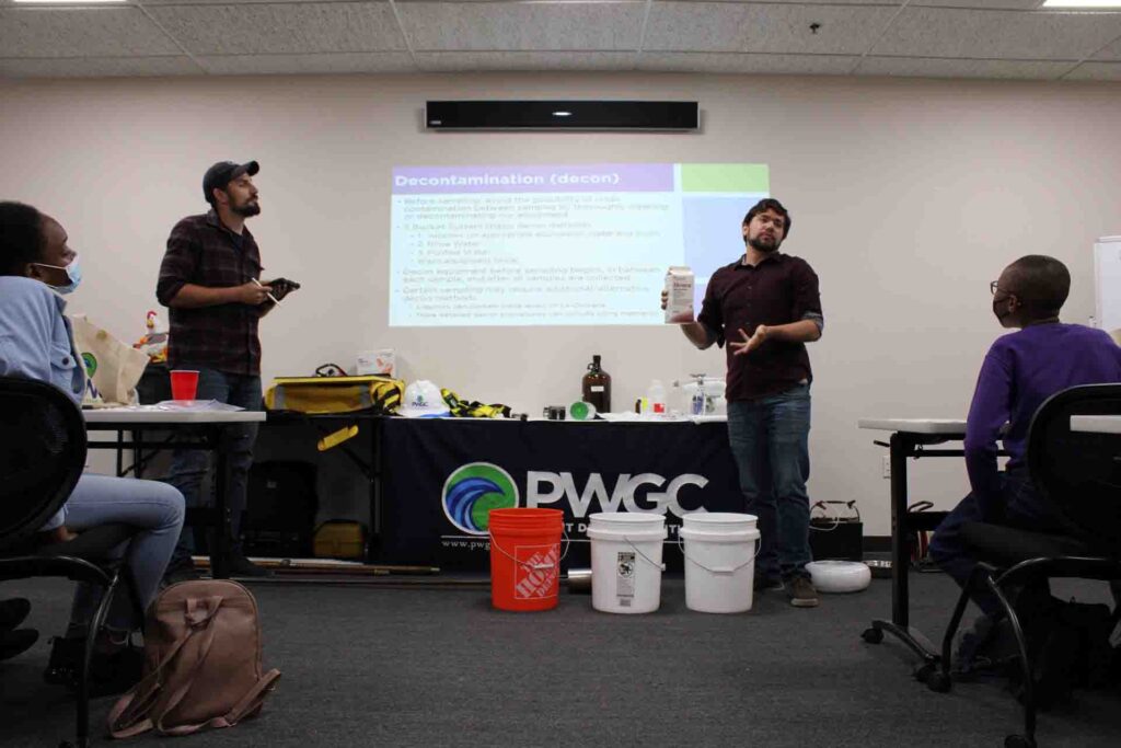 NSBE Region 1 STEM Program Visits PWGC - PWGC Staff demonstrating how to properly clean field equipment