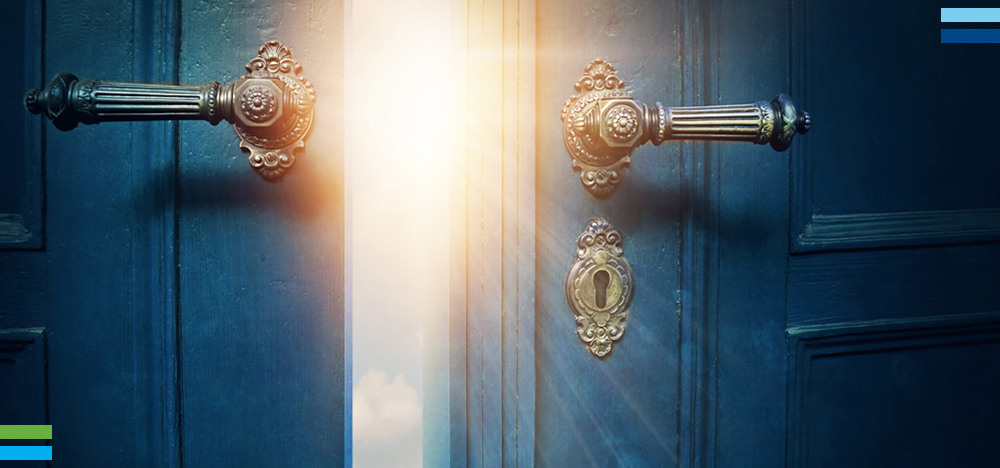 New beginnings - door opening with light shining through