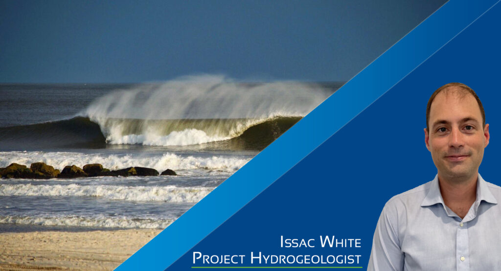 Ride the Wave Award September 2023 - Wave Crashing on shore, photo of Issac White, Project Hydrogeologist