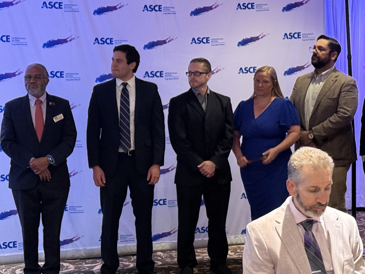 Engineering Leadership on Long Island, Tim D'Agostino, PE, ENV SP, Project Manager (Second from the left), and Jenny Heflich, PE, Project Manager (fourth from the left)