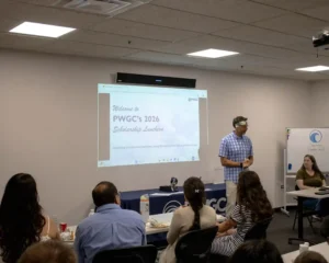 Paul K. Boyce addressing and welcoming PWGC employees and guests